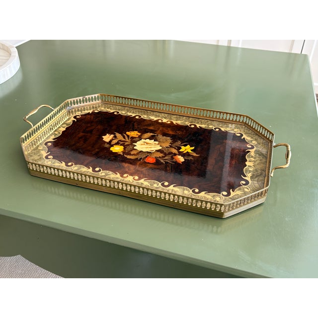 A beautiful mid-century Italian marquetry serving tray in a canted-corner octagonal shape. The center has an inlaid floral...