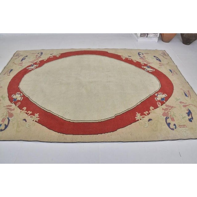 Cream Vintage Turkish Oushak Area Rug With Bold Red Oval Medallion and Cream Field For Sale - Image 8 of 10