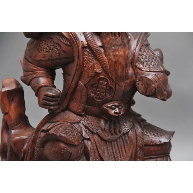 19th Century mahogany Chinese root carving of a seated ancient warrior, very detailed and nicely carved. Circa 1880....