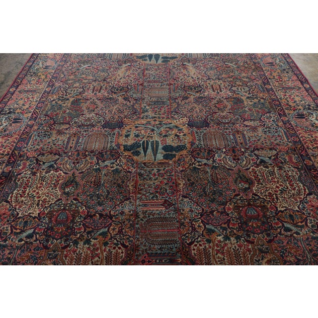 This 9x16 antique Persian rug represents one of the finest curations of the reputed Kerman provenance ever seen by Rug &...
