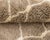 A classic lattice, interrupted with intent: honeycomb texture cut by bold vertical light. A fine ivory honeycomb lattice...