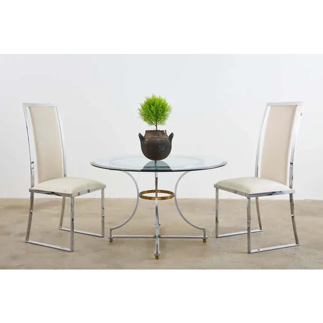 Rare set of six chrome dining chairs designed by Pierre Cardin. Featuring a Milo Baughman inspired flat bar style frame....