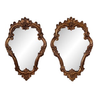 Pair of Italian Rococo Giltwood Mirrors With Antiqued Glass For Sale