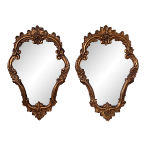 Pair of Italian Rococo Giltwood Mirrors With Antiqued Glass