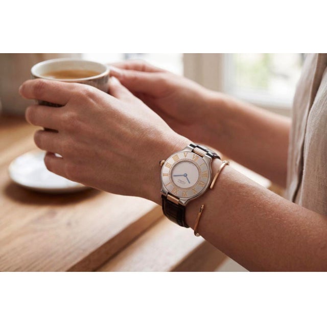 CARTIER Must 21 W10050F4 Watch SSYG Silver/Gold Quartz Ivory Dial A Refined Synthesis of Elegance and PrecisionAdd a touch...