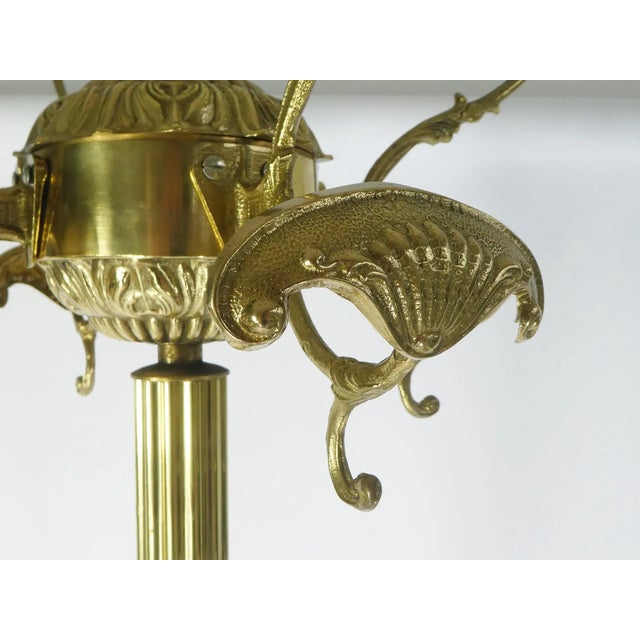 A unique brass Italian coat rack with amazing details all over. The 3 legs have beautiful brass lion figures. The top...