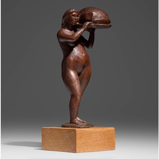 A lovely bronze by the noted California Artist Jorjana Jorgana Holden (1917-2011) titled “The Waitress”. It is Monogrammed...