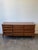 The ultimate mid-century dresser. We are absolutely swooning over this monumental 1960s walnut triple dresser! What makes...