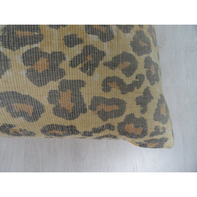 22" square silk and down decorative pillow. Front is faux leopard and back is a bright gold Jim Thompson silk. 80/20 down...