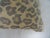 22" square silk and down decorative pillow. Front is faux leopard and back is a bright gold Jim Thompson silk. 80/20 down...
