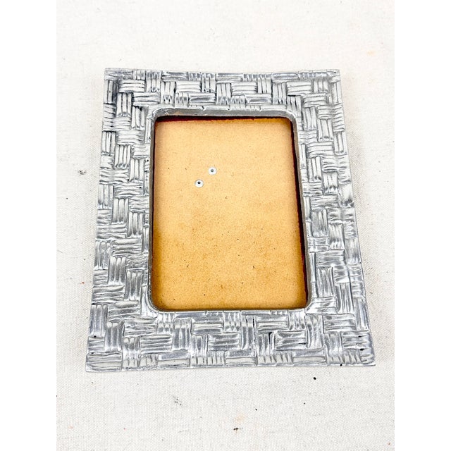 Nice vintage pewter picture frame. Basketweave design. Holds a 4” x 6” picture frame. Makes a lovely gift or addition to...