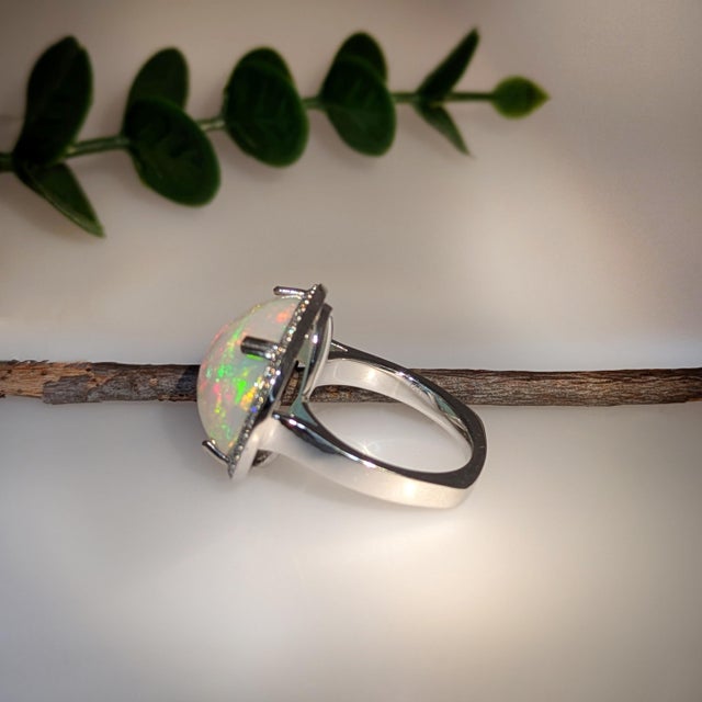 9.4 Carat Statement Opal Ring With Natural Diamond Halo in 14k Gold | Ov 20x15mm, Size 6.75 For Sale In Columbus - Image 6 of 6