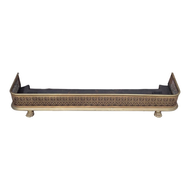 Early 19th Century George III English Pierced Brass Fireplace Fender With Steel Base & Paw Feet For Sale