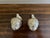 A charming pair of vintage silver-plated artichoke salt and pepper shakers by Godinger, dating to the late 20th century....