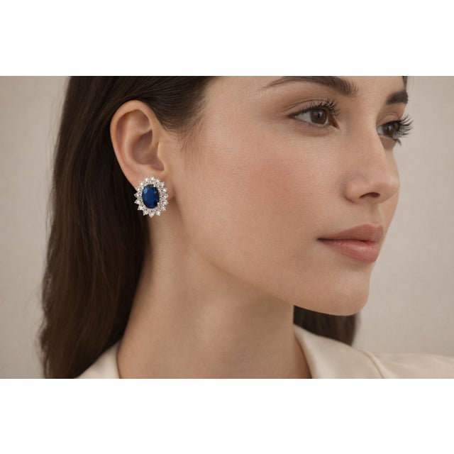 Elevate your elegance with these stunning blue sapphire and diamond earrings, crafted in luxurious 14k white gold....