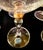 This is vintage set of Bohemian Crystal featuring elegant 24K gold-rimmed detailing. The set includes four champagne...