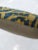 Pillow made from a blue and gold Indian larestan rug. Zipper closure and foam insert provided.