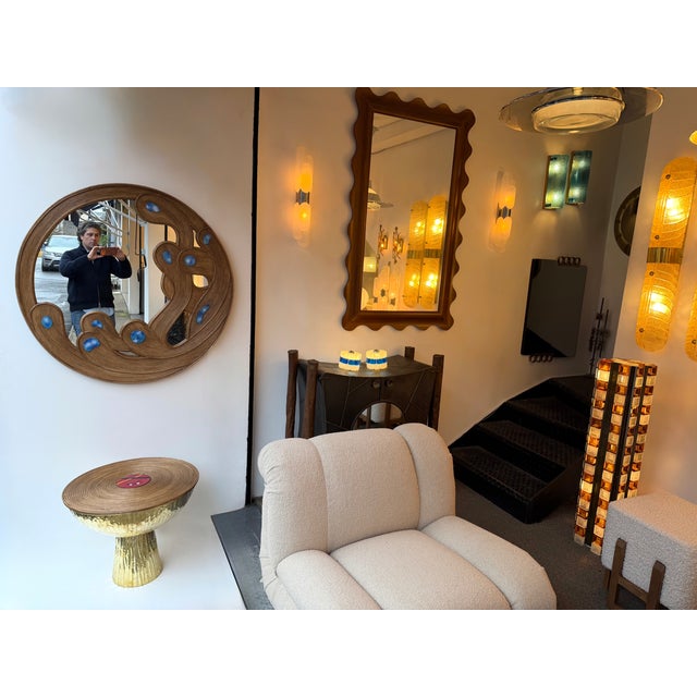 Contemporary wall mirror in nice rattan wicker bamboo marquetry with enamel metal decor. Contemporary work from a small...