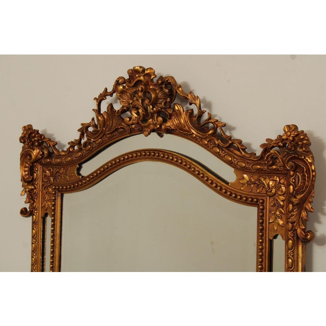 Rococo Mid 20th Century Large Ornately Gilt Carved Wall Mirror For Sale - Image 3 of 18
