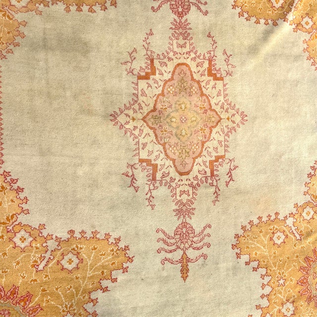 This large Oushak rug is a traditional Turkish rug originating from the city of Usak in western Turkey. Rug has muted...