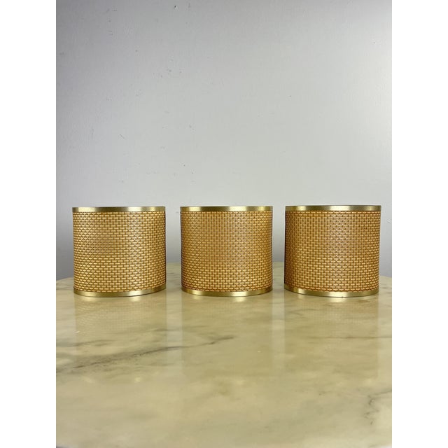 Set of 3 Mid-Century rattan wall lamps from the 1960s. Metal structure, E27 lamps. Intact and in good condition. European...