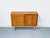 A high-quality cabinet crafted from oiled oak with a warm, natural look. The two sliding doors, with their distinctive...