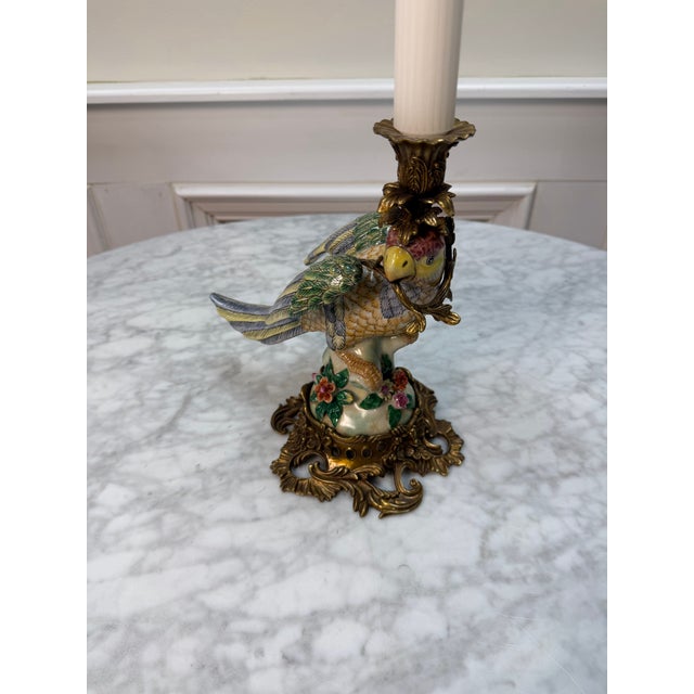 Elevate your space with this stunning vintage Chinoiserie-style parrot candle holder. This exquisite piece features a...
