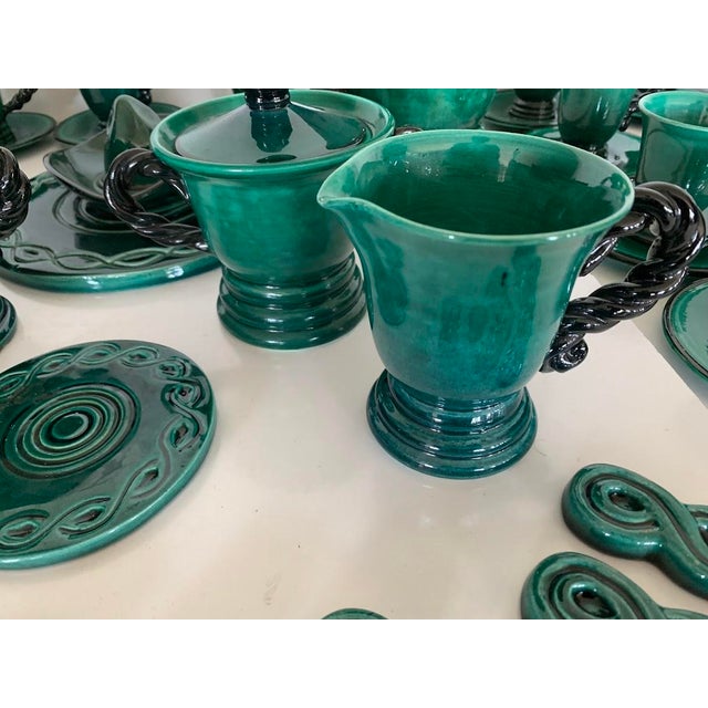 Enameled stoneware coffee and tea service Marked by Marius Giuge Ceramist in Vallauris 46-piece set Good condition This...