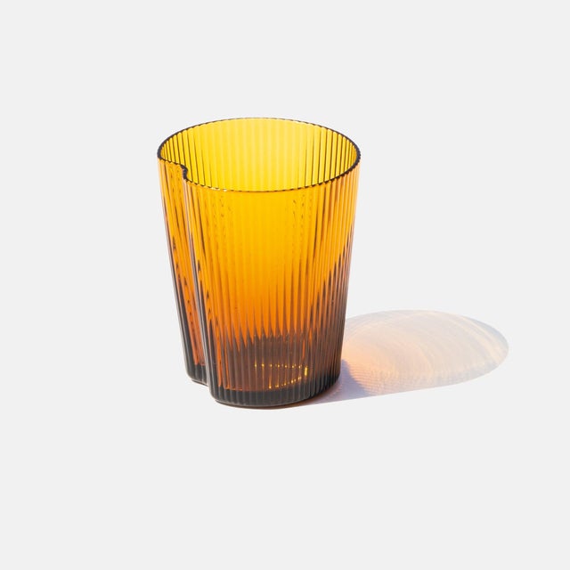 The Handy tumbler combines ergonomic shape with elegance of texture and color. Made of mass-colored, hand-blown, and...