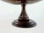 A substantial vintage wood centerpiece bowl with a beautifully elongated oval form raised on a turned pedestal base....