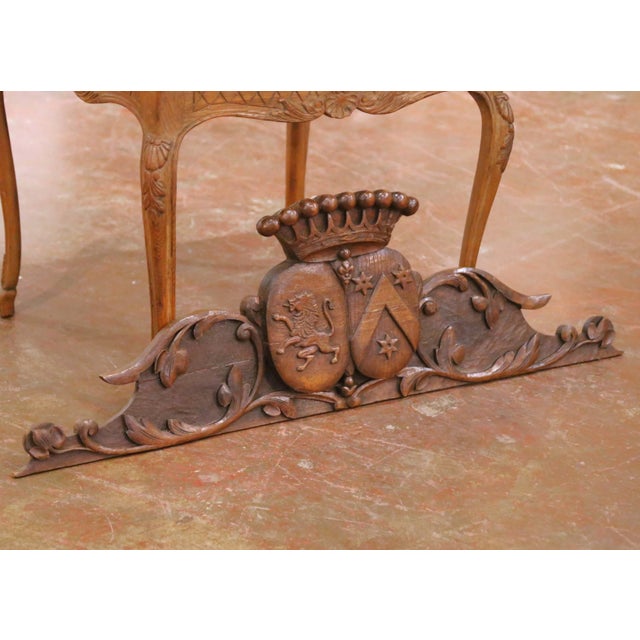 This finely carved antique French walnut architectural panel dates to circa 1820 and was crafted during the Restoration...