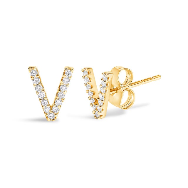 Expertly crafted to symbolize individuality and grace, this exquisite "V" initial stud earring is fashioned from radiant...