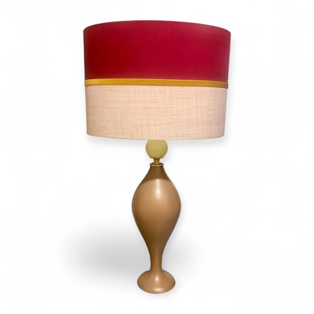 This elegant pair of table lamps combines the delicate beauty of Murano glass with handcrafted design. Each lamp features...
