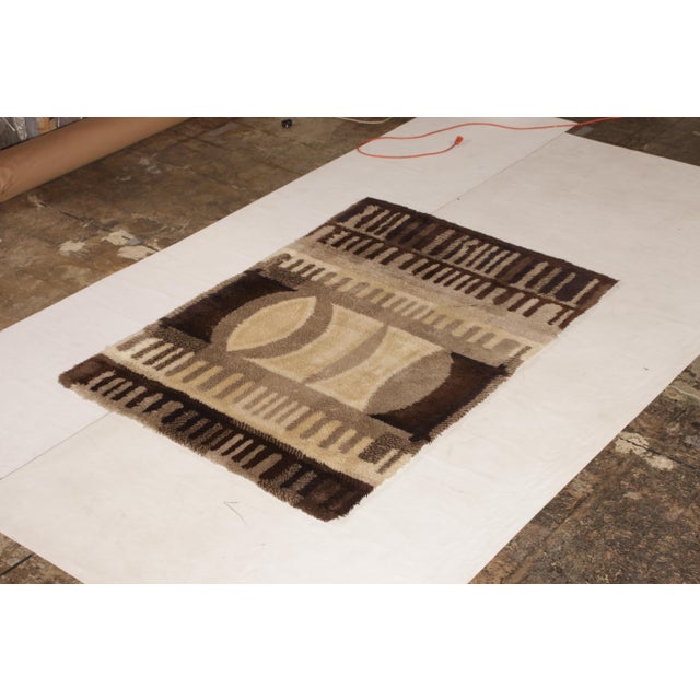 Hand knotted in lush wool pile originating from Denmark circa his mid-century rug hails from the celebrated Ege Rya rug...