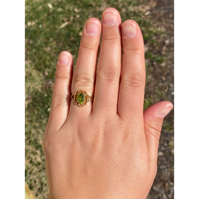 The Spiralizer: Spiralized Oval Peridot Ring in Yellow Gold For Sale - Image 10 of 11