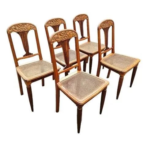 The Set of Five Art Nouveau Dining Chairs is a wonderful and unusual treasure from the 20-century furniture design era....
