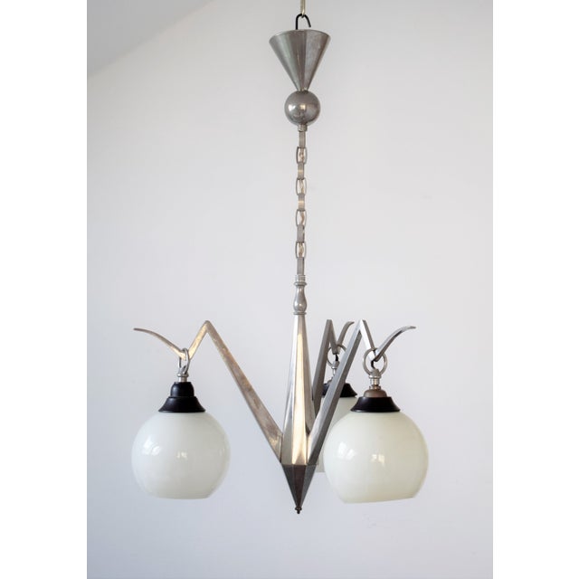 Ceiling lamp made of solid cast brass - nickel-plated. 3 glass bowls with E27 base Up to 250V (Europe/UK Standard).The...