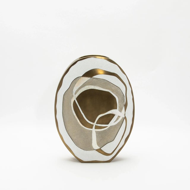 The Rose Vase by Kifu Paris is a stunning creation that embodies contemporary luxury through its masterful combination of...