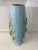 Beautiful tall vase by Fratelli falcaniucci has a purple interior and wheat relief on both sides