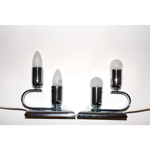 This pair of table lamps, also intended for mounting on the wall, each requires two E14 bulbs. They have a built-in...