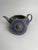 This Wedgwood drabware stoneware teapot, dating to around 1830, is a beautifully refined example of the company's mastery...