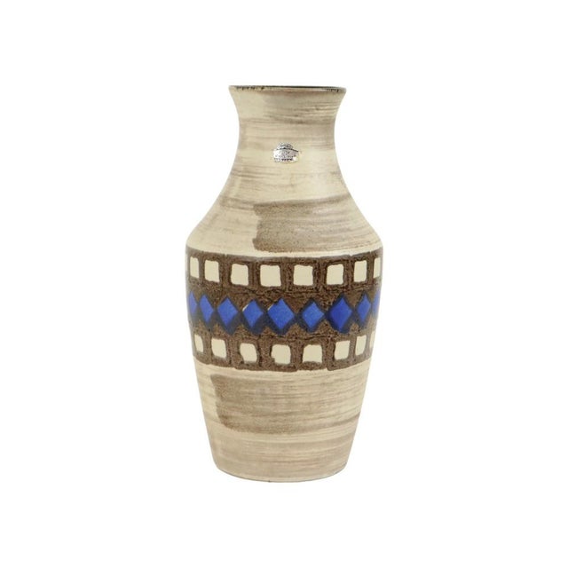 Vintage Bay Keramik vase featuring beige, brown, and blue tones and an abstract pattern around the middle; a piece of...