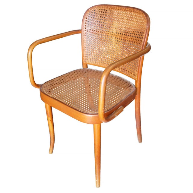 Refined and sculptural, this set of six Stendig cane armchairs is attributed to Josef Hoffmann and crafted in...