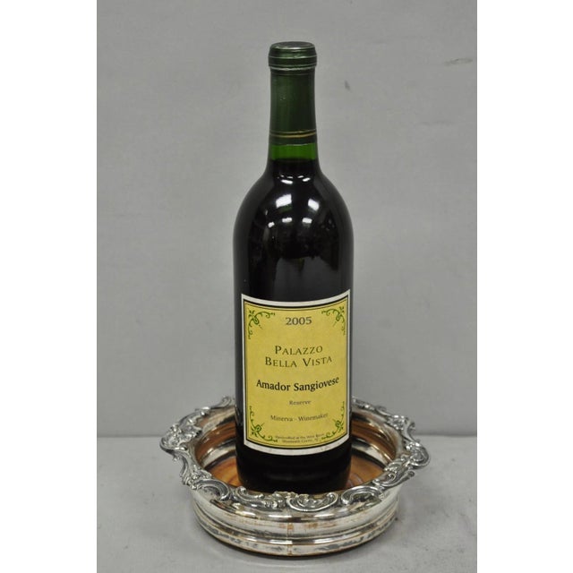 Antique English Victorian Silver Plated Floral Repousse Bar Wine Bottle Coaster. Circa Early 20th Century. Measurements:...