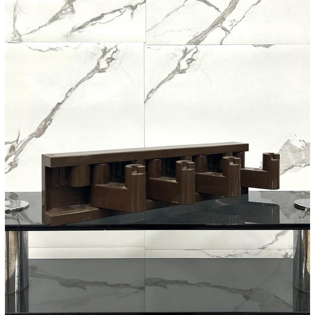 MINIVIP foldable wall-mounted coat rack, produced by Milan-based Velca, a well-known manufacturer of design objects,...