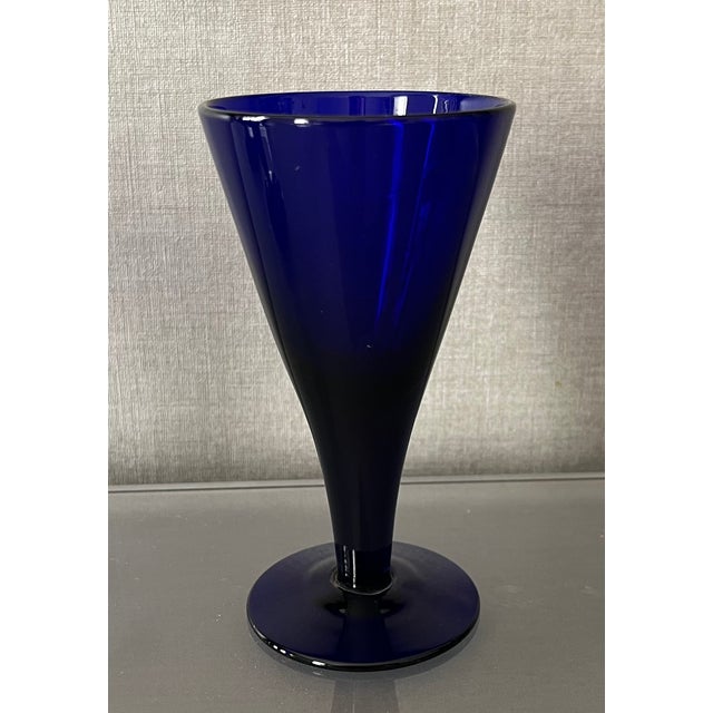 Set 5 antique early 19th century Anglo Irish George III blue cobalt wine glasses. Conical shape with rough pontils on the...