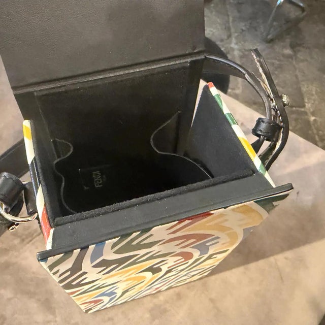 Part of the celebrated Summer 2021 capsule collection, this vertical box shoulder bag is the result of a creative...