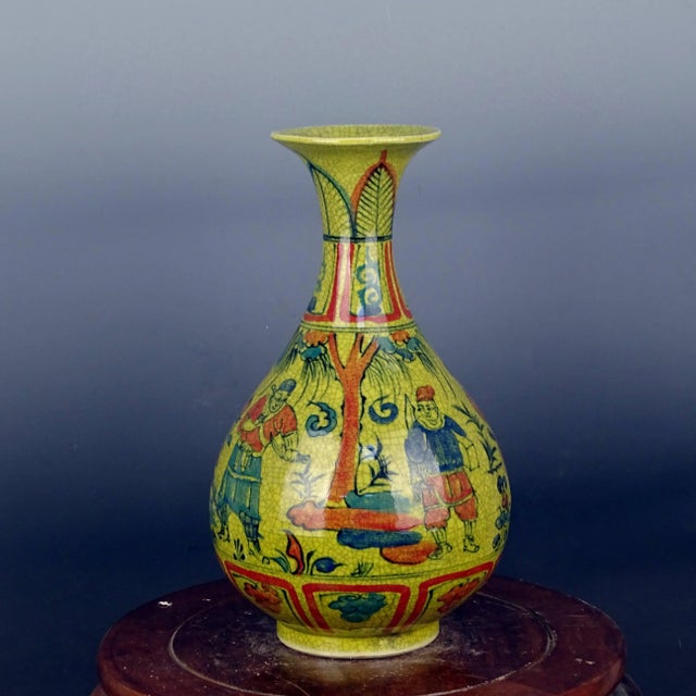 W-20cm,H-cm The Jiajing Marked Blue and White Doucai Porcelain Yuhuchun Vase features intricate painted figures on a base...