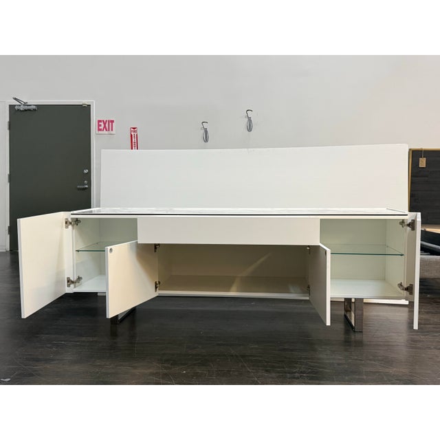 Design Plus Gallery presents the Horizon Sideboard from Calligaris. This white lacquered sideboard pairs a faux marble...