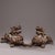 This is a matched pair of substantial antique bronze sculptures depicting Pixiu, mythical creatures revered in traditional...
